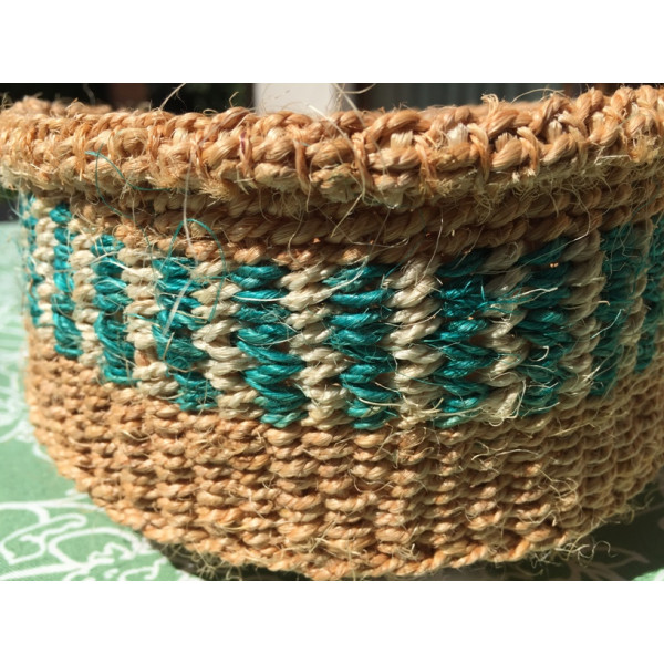 Wicker bread basket made of natural material with light blue and white pattern