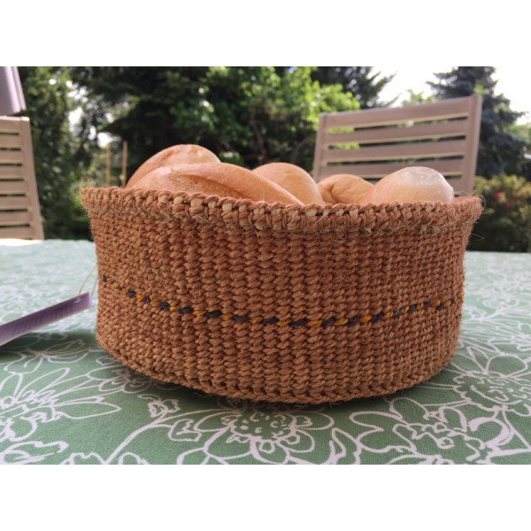 Wicker bread basket made of natural material, round, yellow-blue single line  pattern
